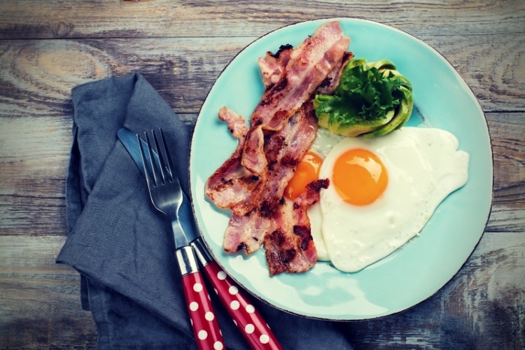 Continental breakfast with fried eggs